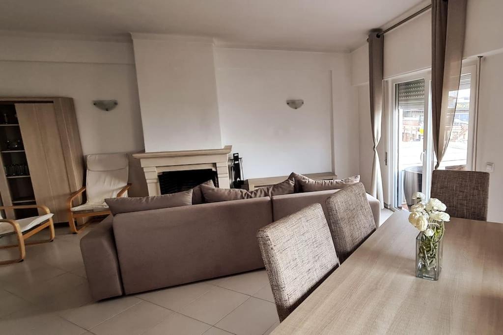 a living room with a couch and a table at 403 - Oura - 2 bedroom- Sea View in Albufeira
