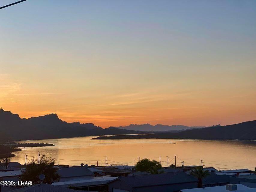 a view of a body of water at sunset at Million-dollar Lake view on the Parker Strip! in Parker