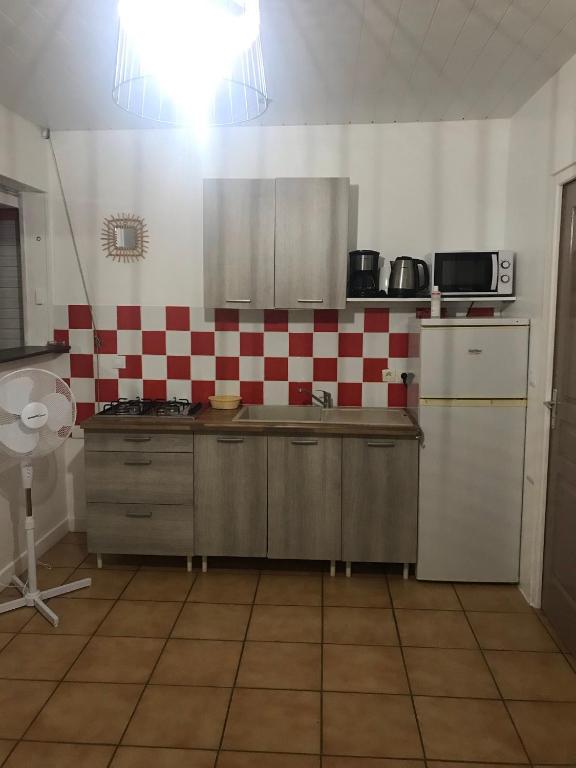 Köök või kööginurk majutusasutuses Residence Les Palmiers