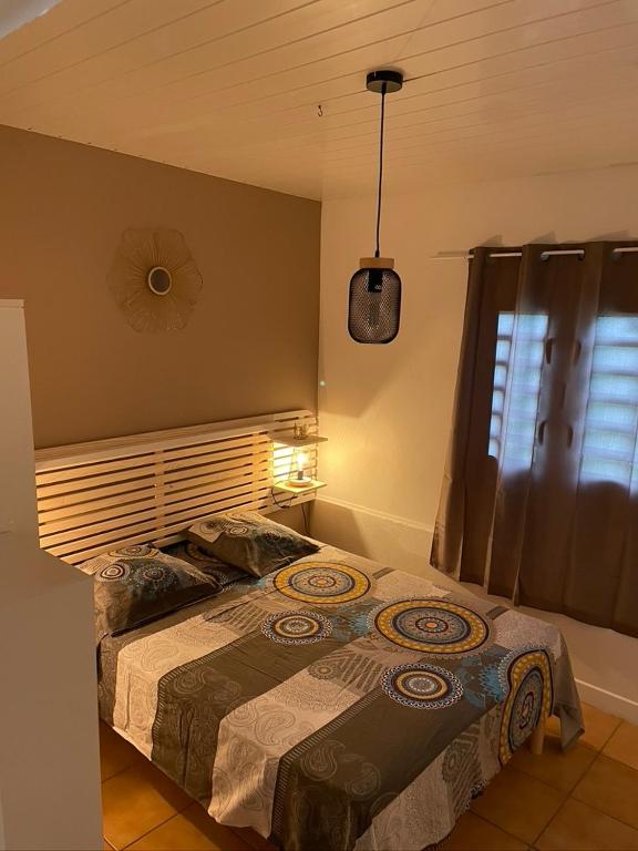 Voodi või voodid majutusasutuse Residence Les Palmiers toas