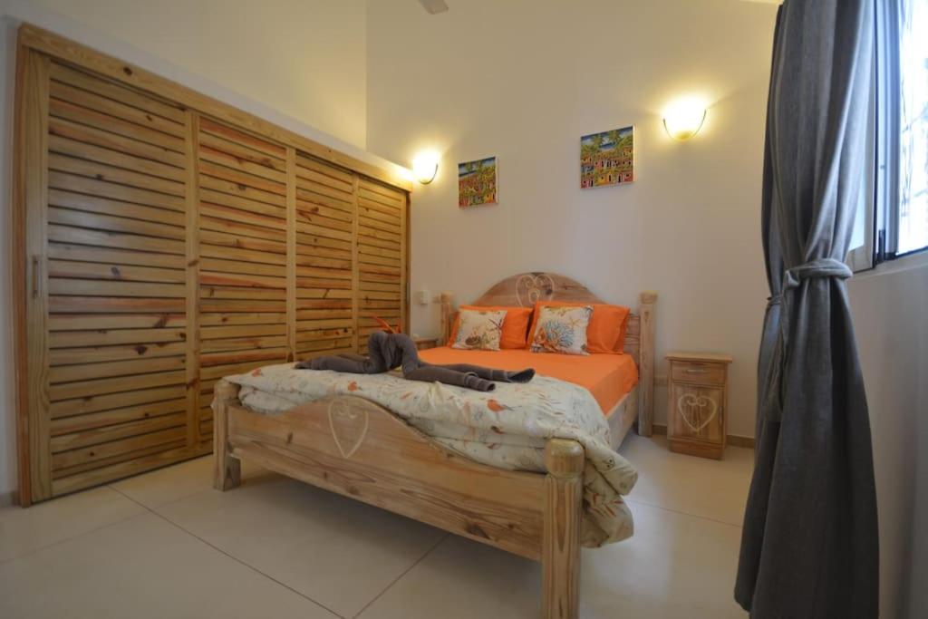Postel nebo postele na pokoji v ubytování Chambres privées dans villa