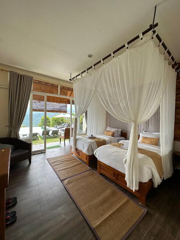 Voodi või voodid majutusasutuse Atres Sari Resort toas