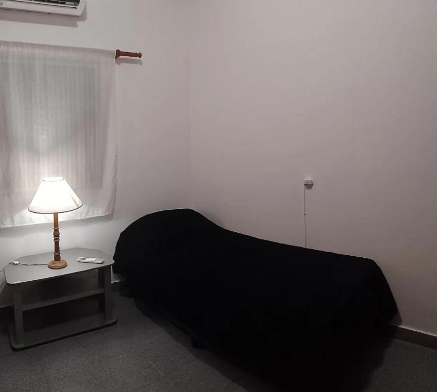 Postel nebo postele na pokoji v ubytování Casa de Neley