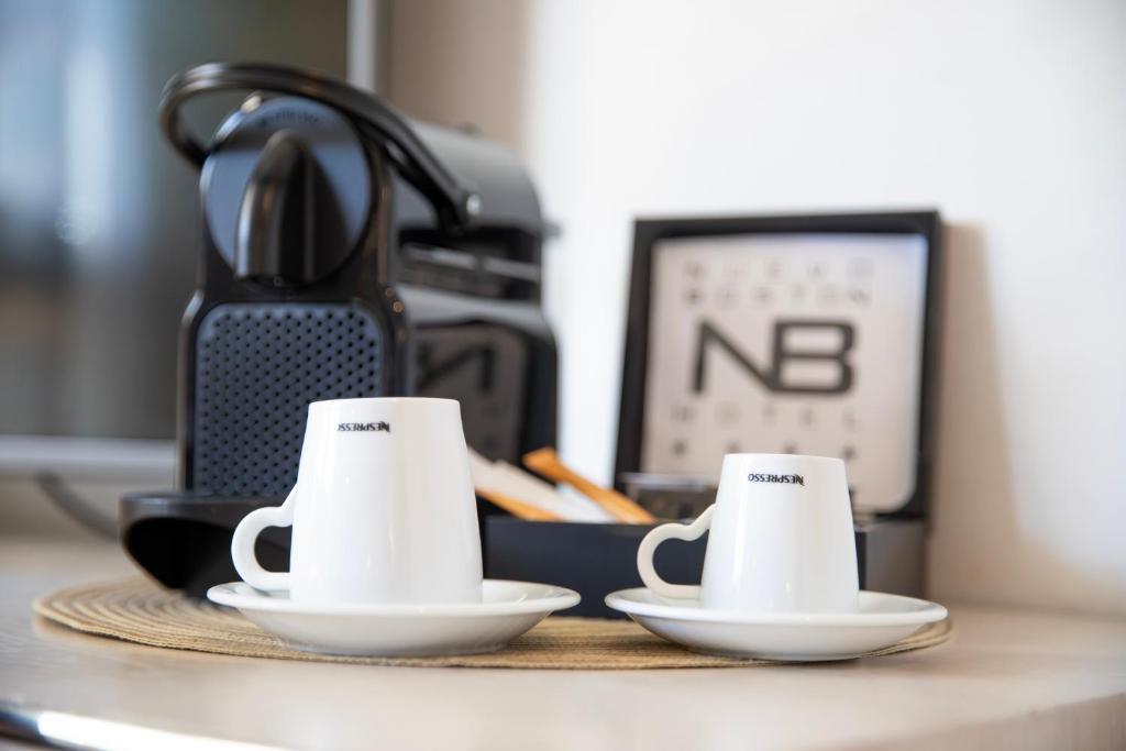 Utensilios para hacer té y café en Hotel Nuevo Boston