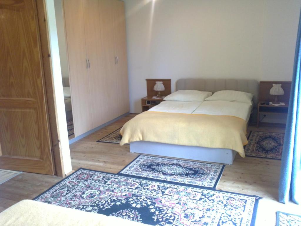 Postel nebo postele na pokoji v ubytování Ferienwohnung - Apartement - Hotel Klippitz Nordost