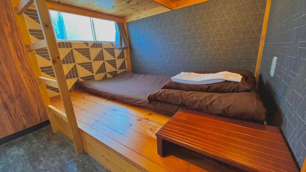 Postel nebo postele na pokoji v ubytování R Hostel Namba south