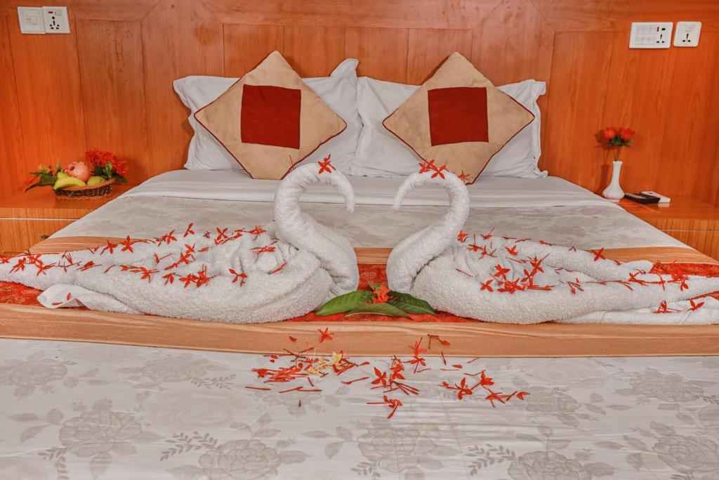 Postel nebo postele na pokoji v ubytování Hotel Wildlife Camp