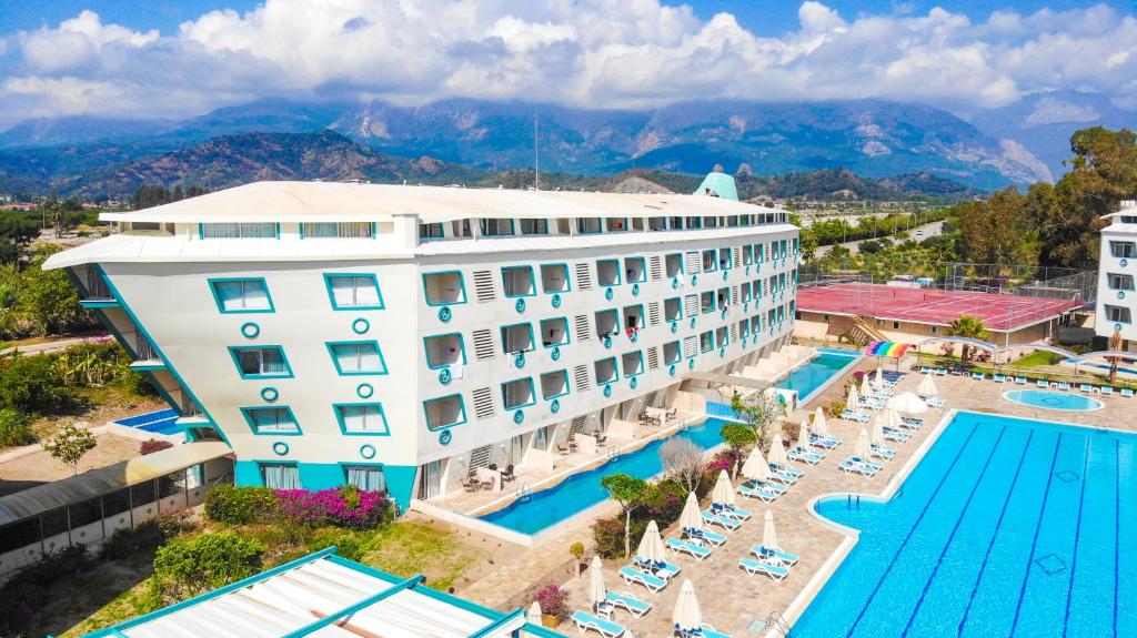 an aerial view of a hotel with a swimming pool at Daima Biz Hotel - Dolusu Aquapark Access in Kemer