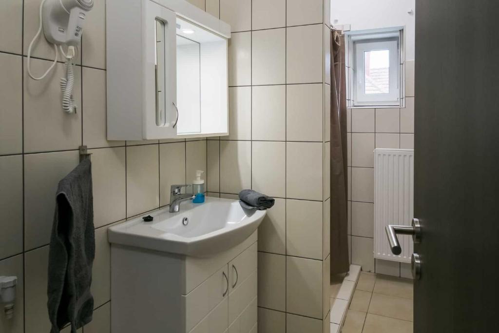 Kúpeľňa v ubytovaní SárvárLAK Apartmanház