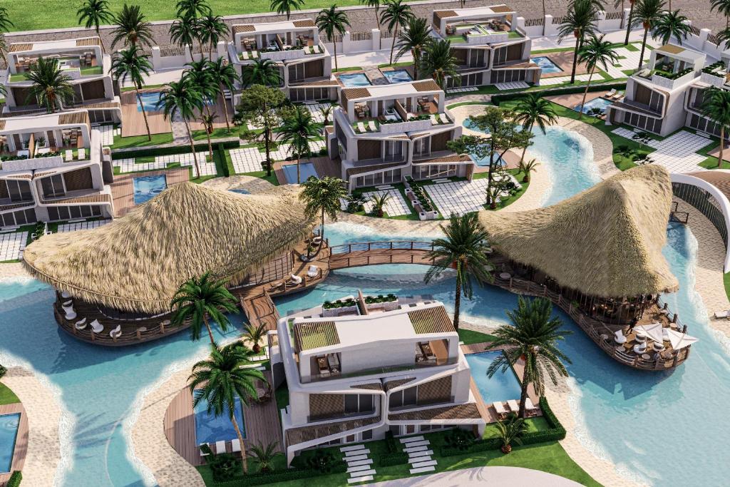 einen Luftblick auf ein Resort mit einem Pool in der Unterkunft club arona by laren hotels in Serik