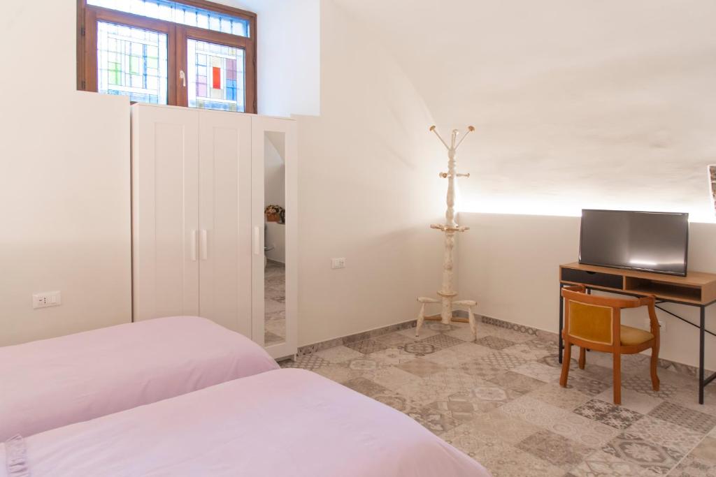 TV a/nebo společenská místnost v ubytování LA CURT guest house