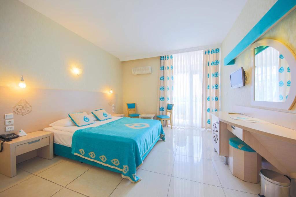 Postel nebo postele na pokoji v ubytování Daima Biz Hotel - Dolusu Aquapark Access