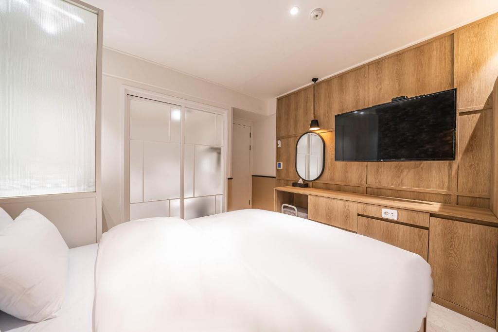 TV a/nebo společenská místnost v ubytování HOTEL STAY AYANA DAEJEON