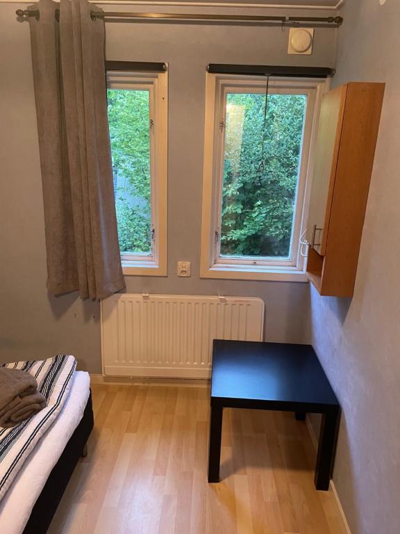 Postel nebo postele na pokoji v ubytování Stuga i naturskönt område i Höör
