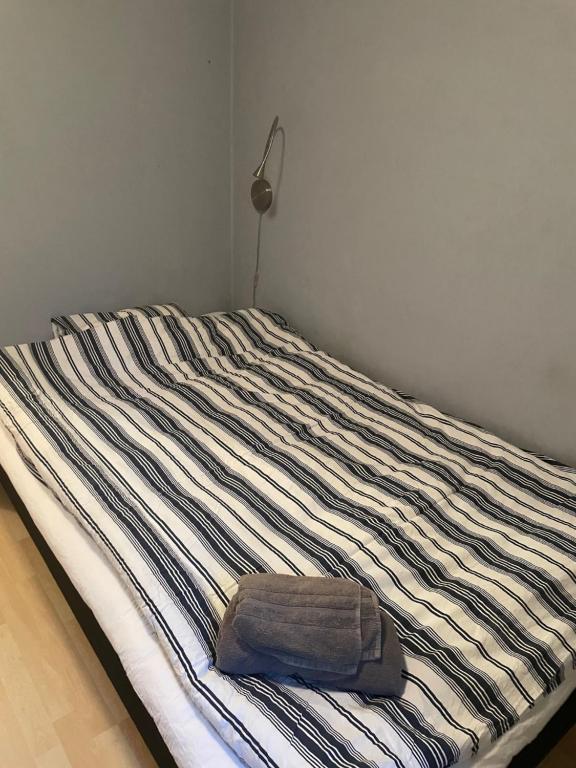 Postel nebo postele na pokoji v ubytování Stuga i naturskönt område i Höör