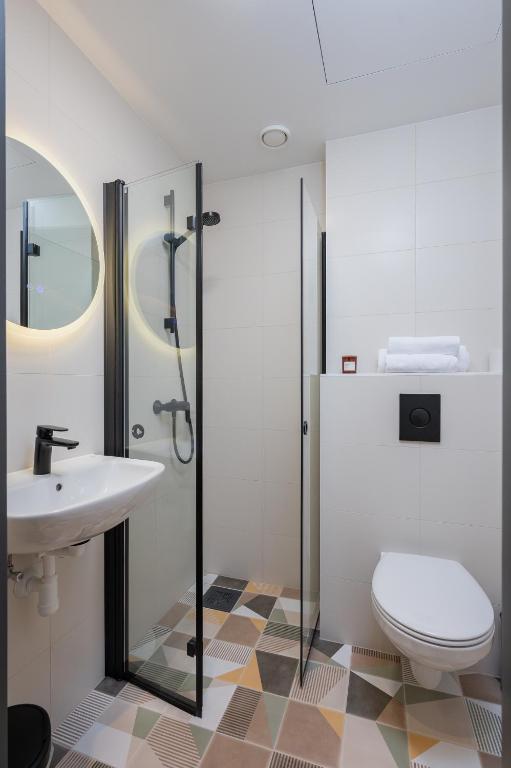 Koupelna v ubytování Rare Apartments - Self Check-In Miniapartments