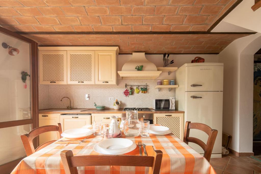 A kitchen or kitchenette at Cottage with private pool