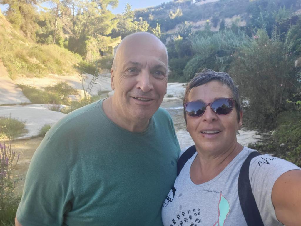 a man and a woman standing next to a river at Casa Jetizo in Ontinyent