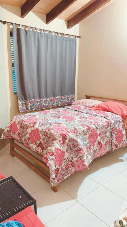 เตียงในห้องที่ Aregua ROGA