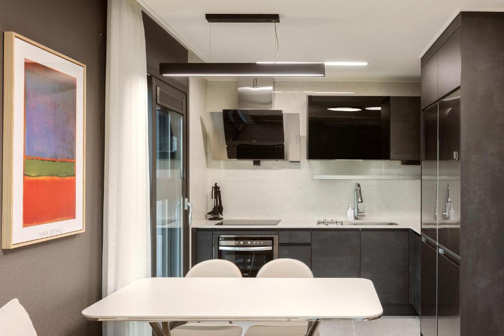 Kuchyň nebo kuchyňský kout v ubytování NewCZ Osiria Residence