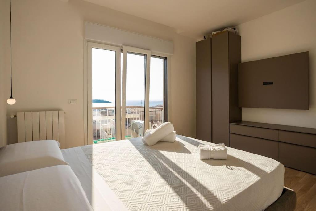 Ένα ή περισσότερα κρεβάτια σε δωμάτιο στο Luxury Cefalù Saint Mary