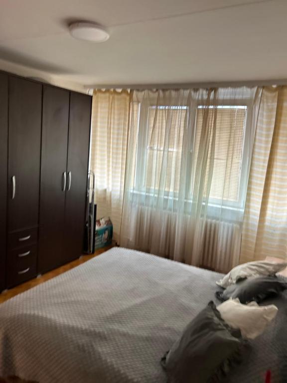 Ліжко або ліжка в номері Beo shooping centar