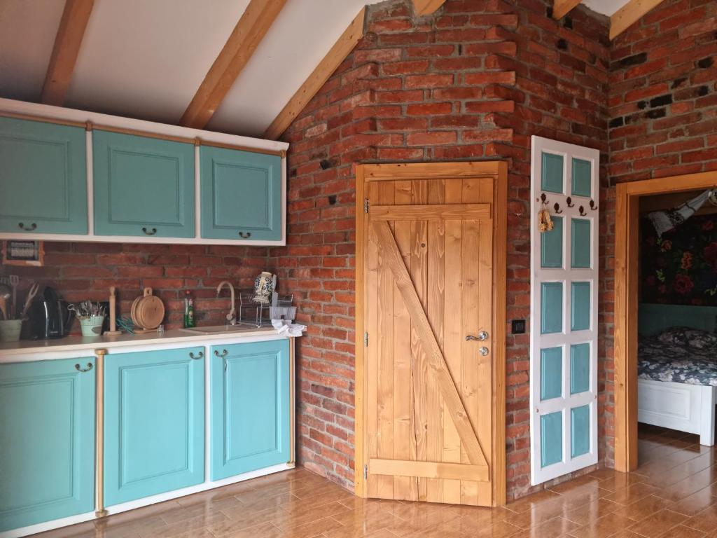 Kuchyň nebo kuchyňský kout v ubytování Cabanele Borsa View