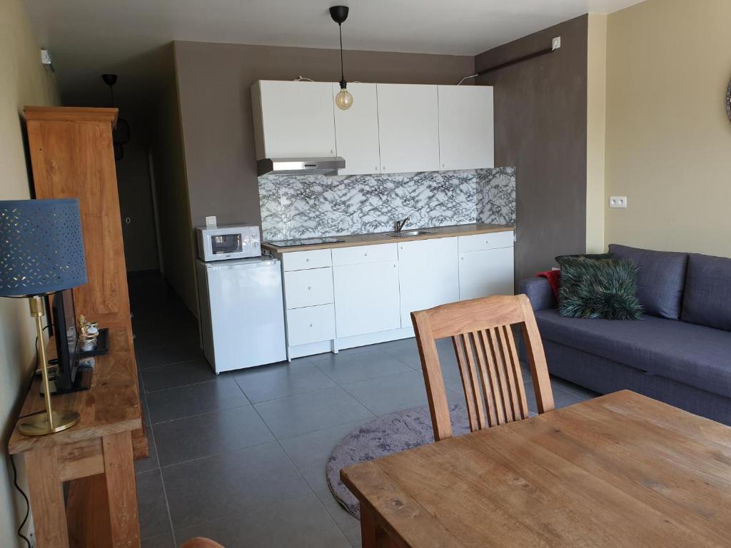 Kuchyň nebo kuchyňský kout v ubytování Het Zonnetje -Vakantiewoning en Bed and Breakfast