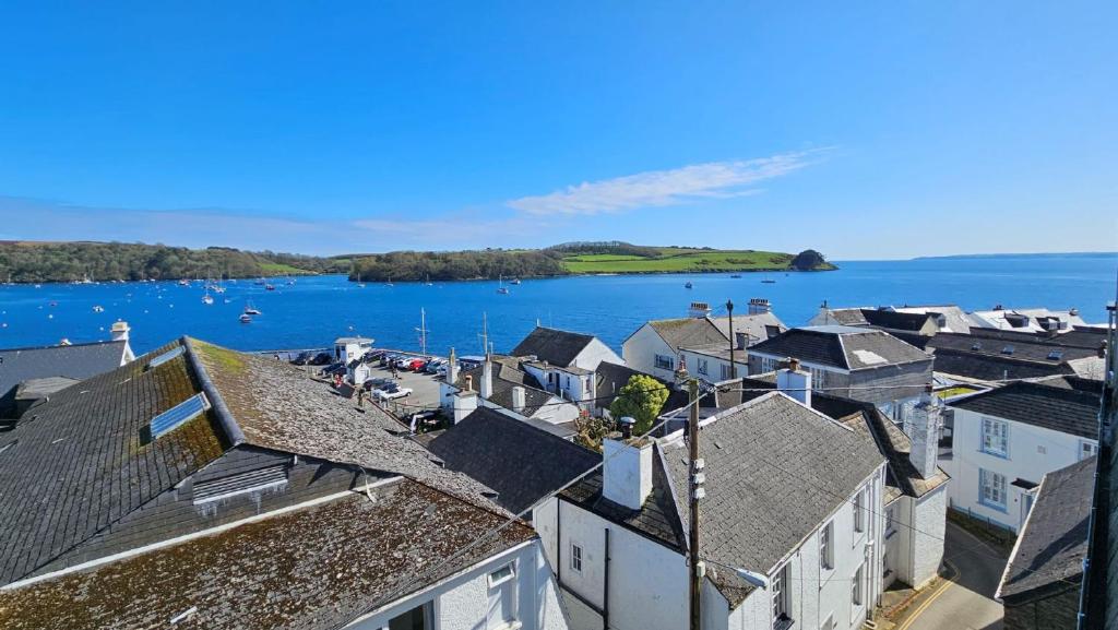 an aerial view of houses and a body of water at Pennant in Saint Mawes