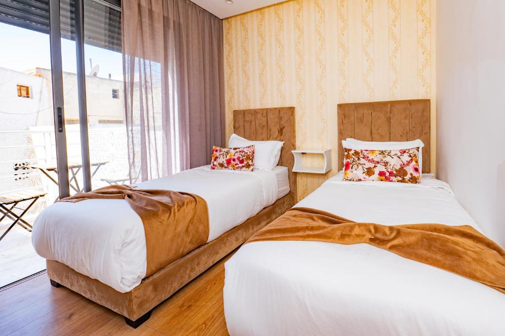Postel nebo postele na pokoji v ubytování Family Aparthotel