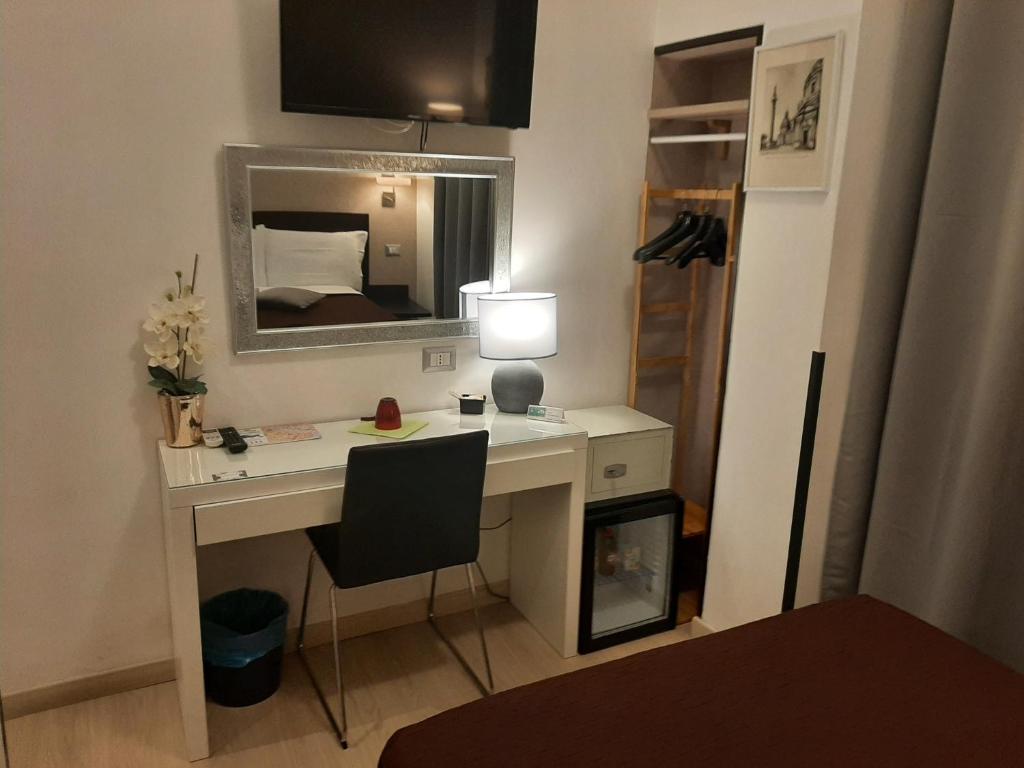 TV a/nebo společenská místnost v ubytování Roman Residence