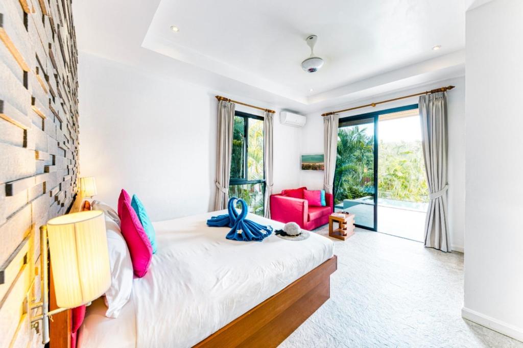 Postel nebo postele na pokoji v ubytování -20 Off per cent Luxury Mango Villa