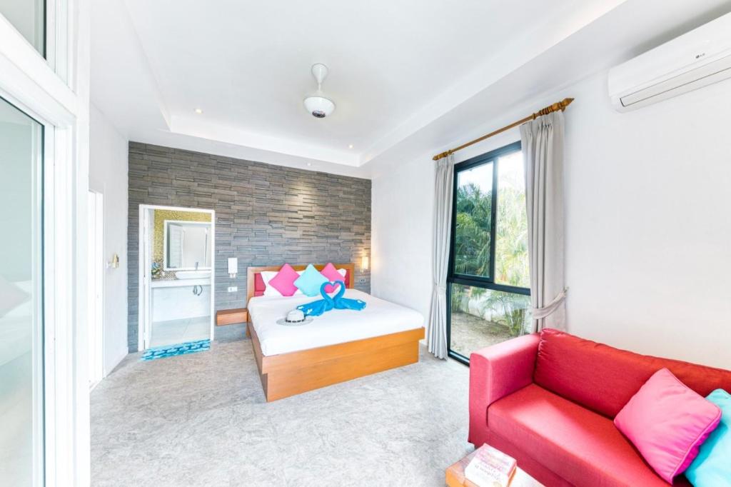 Postel nebo postele na pokoji v ubytování -20 Off per cent Luxury Mango Villa