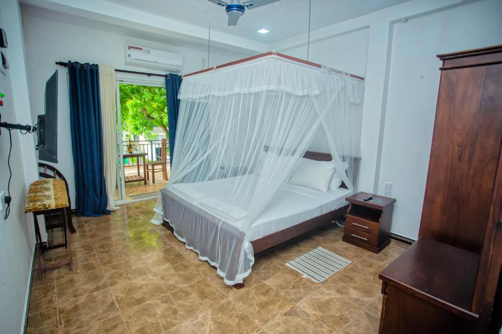 Postel nebo postele na pokoji v ubytování SHERON RESORT