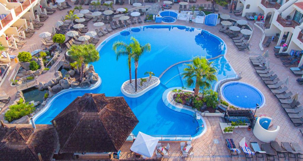an overhead view of a pool at a resort at Royal Sunset Beach Club in Adeje
