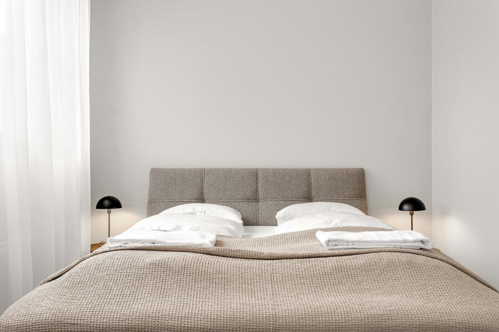Кровать или кровати в номере The Swan House by Heimaleiga