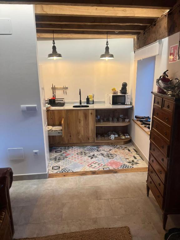 Kuchyň nebo kuchyňský kout v ubytování APARTAMENTOS KERCUS
