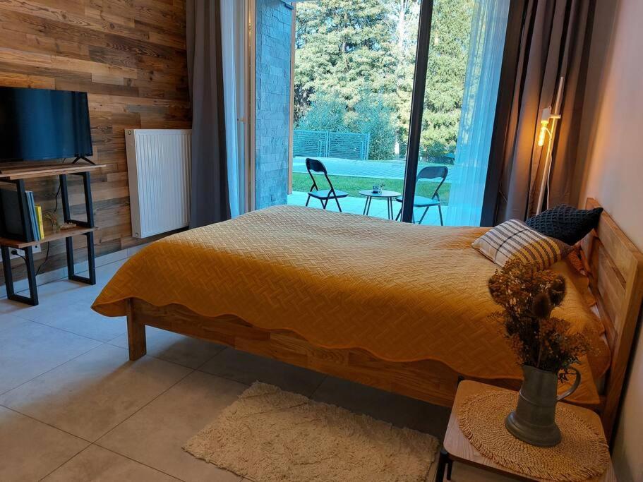 Postel nebo postele na pokoji v ubytování Mountain Lodge Studio Forset View
