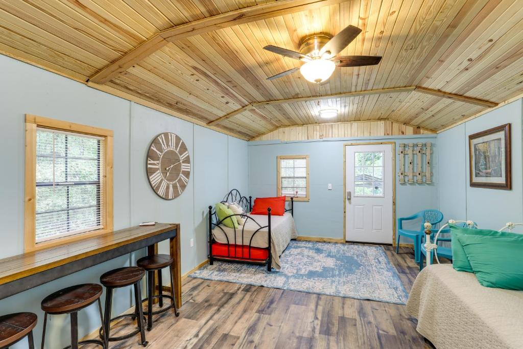 a living room with a wooden ceiling at Peaceful Alton Vacation Rental with Grill! 