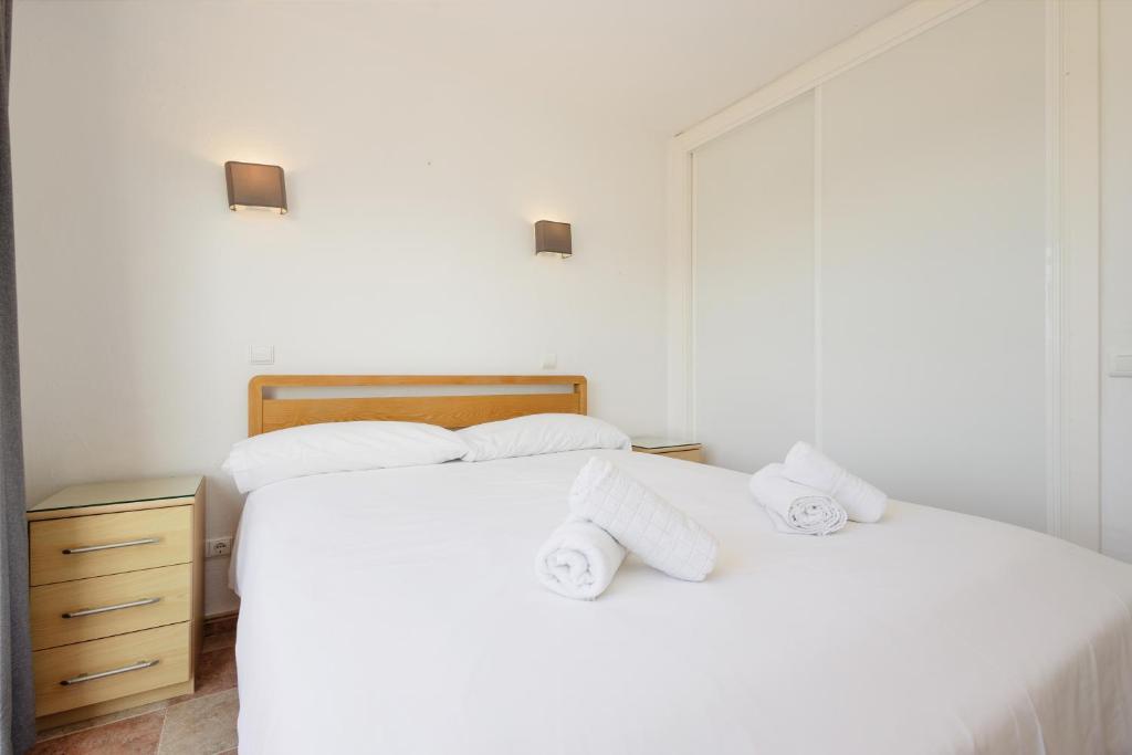 Postel nebo postele na pokoji v ubytování Cozy holiday home at the beach in Costabella, Marbella