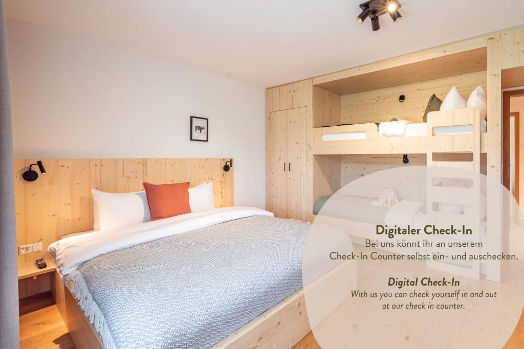 a bedroom with a bed with a wooden wall at stuub jostal in Titisee-Neustadt