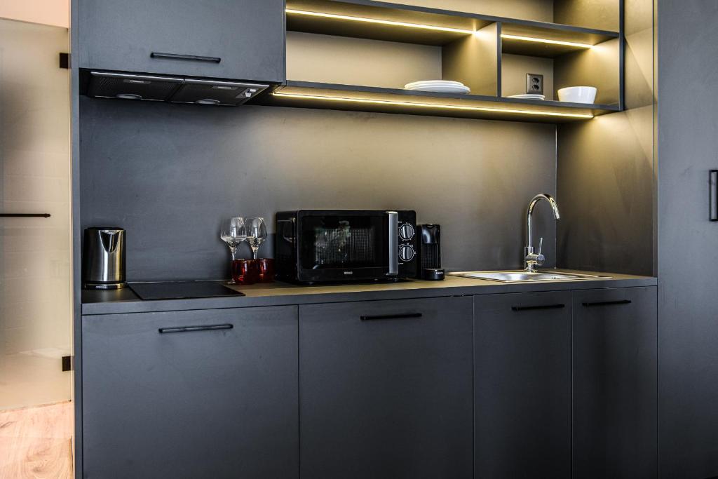 Una cocina o cocineta en Afterwork Hotel