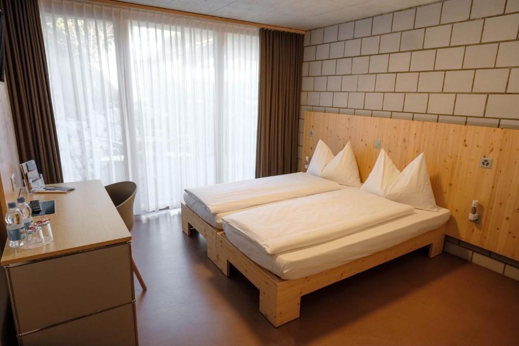Postel nebo postele na pokoji v ubytování Hotel Seaside