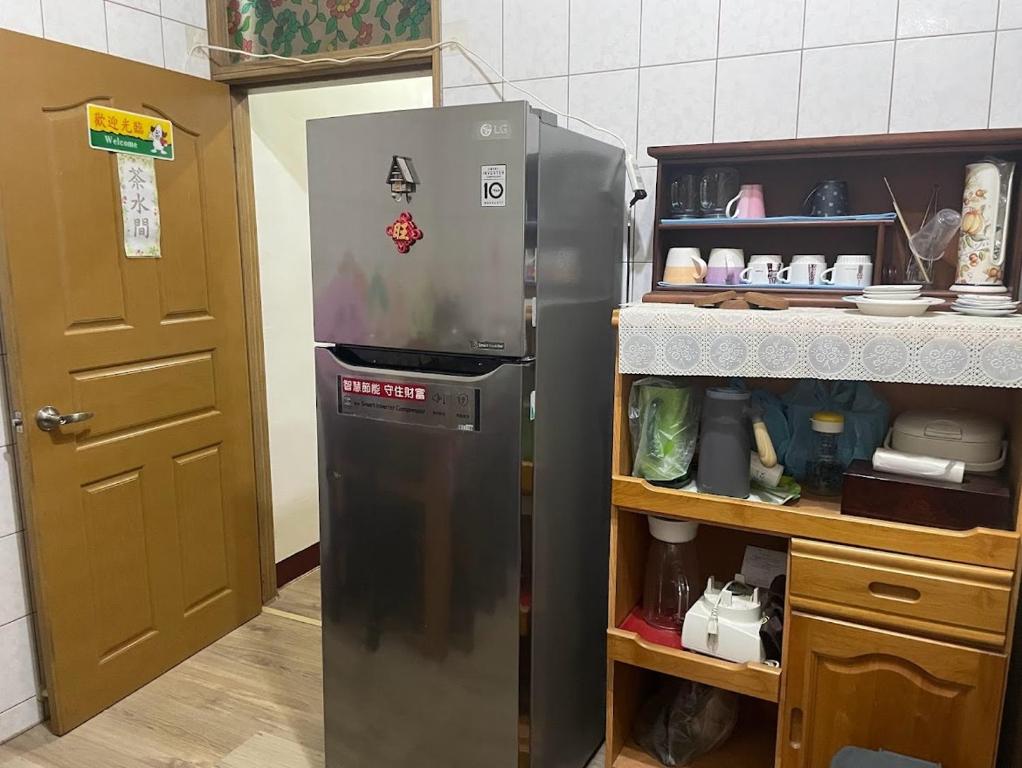 Kuchyň nebo kuchyňský kout v ubytování Jiajia Inn