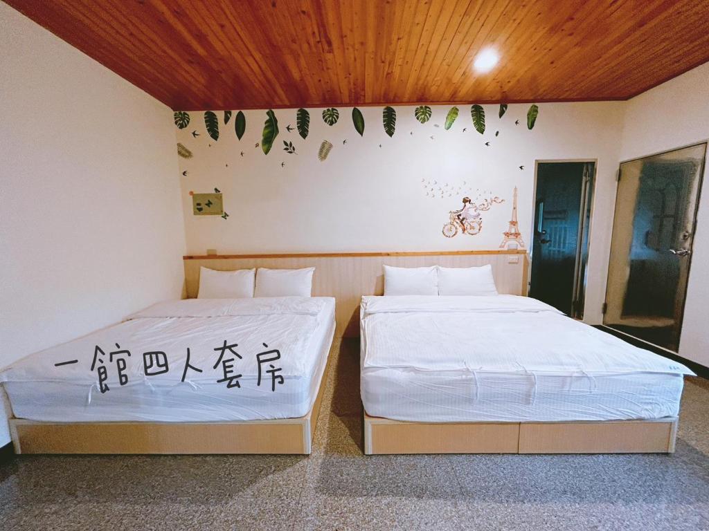 Postel nebo postele na pokoji v ubytování 星森林包棟住宿-台中東勢-山區景觀