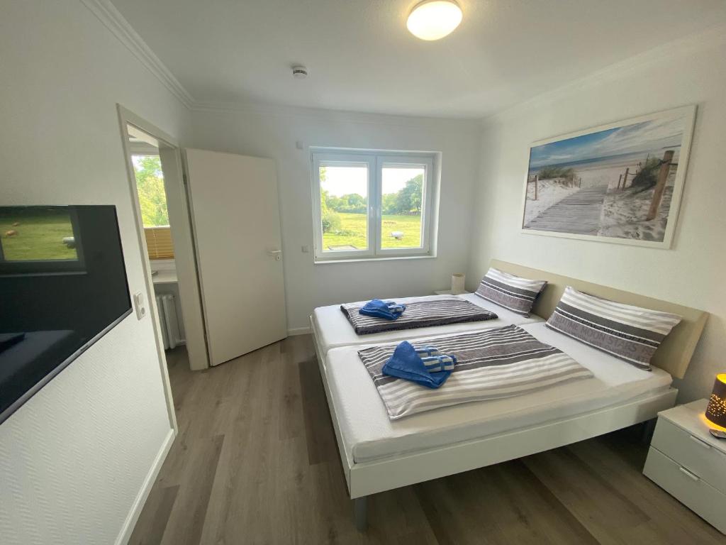 Postel nebo postele na pokoji v ubytování Haus Regina