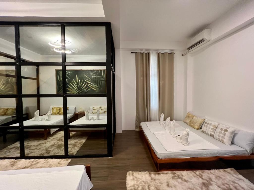 Katil atau katil-katil dalam bilik di Tranquil Villa - Siargao