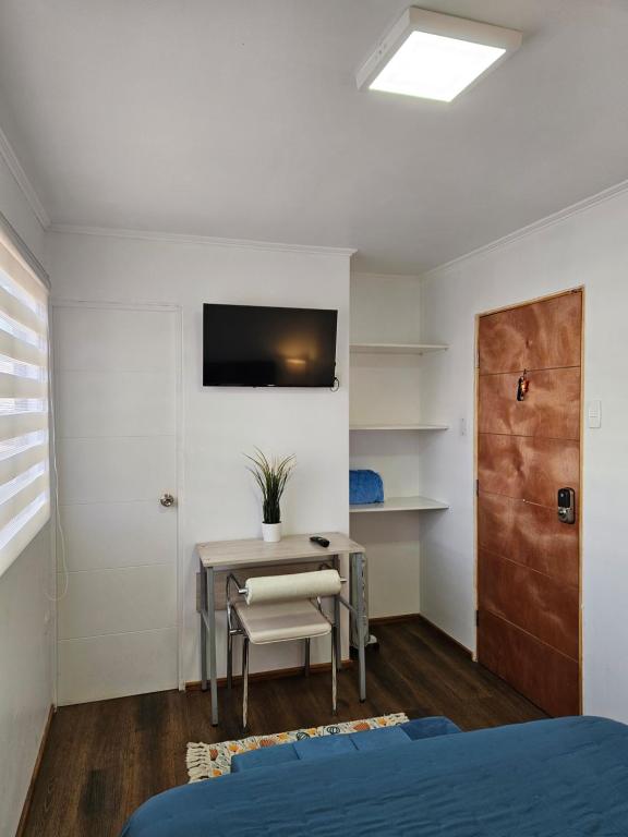 TV a/nebo společenská místnost v ubytování Guest House Club Hípico