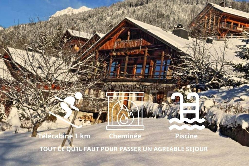a log cabin in the snow in front at La Ferme du Nant - Portes du Soleil in La Chapelle-dʼAbondance