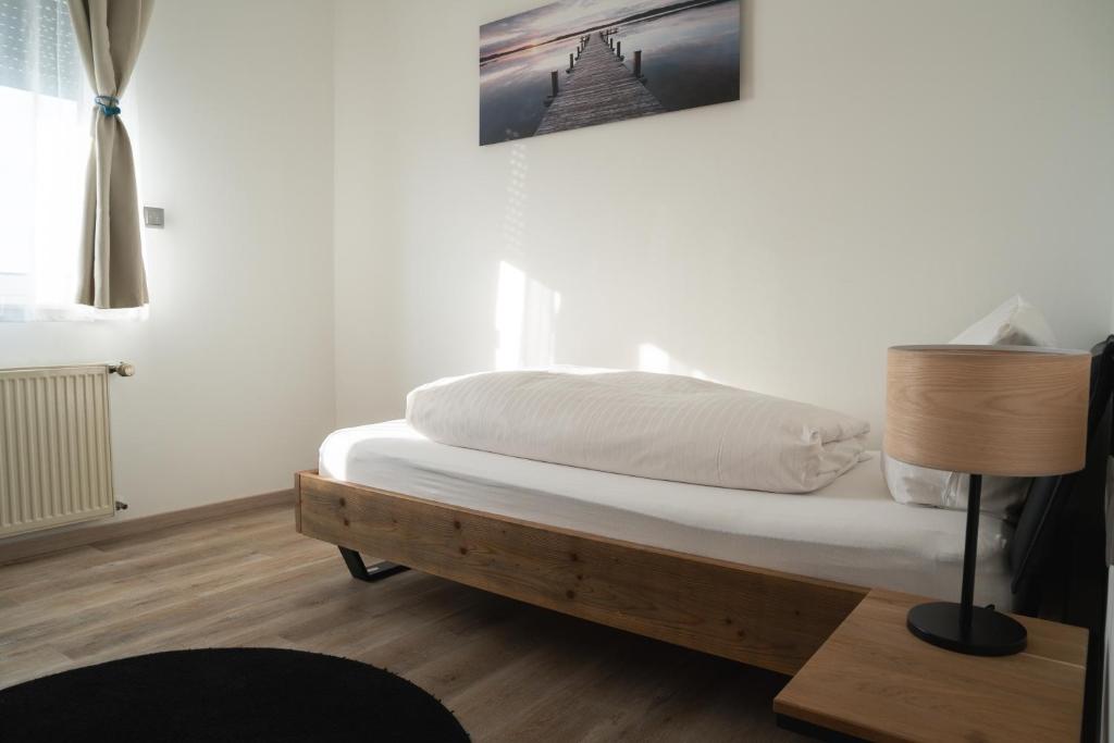 Postel nebo postele na pokoji v ubytování E&D Hotel Rodgau